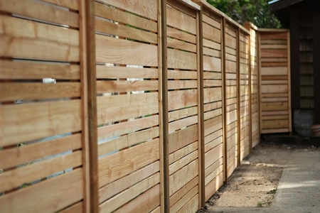 rolling gate black commercial wood fence